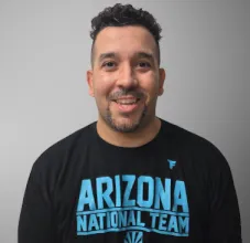 Coach Manny Reyes assistant club wrestling coach