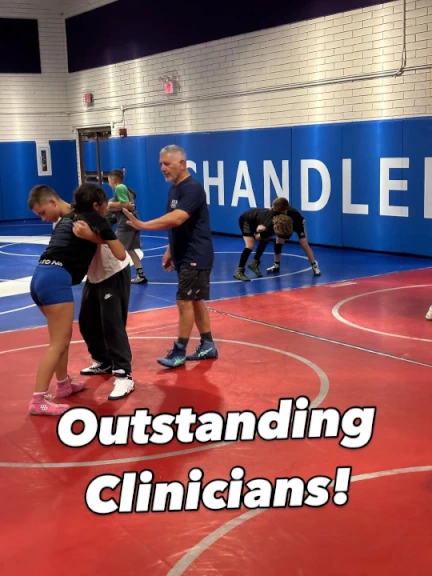 Jim Martinez Olympic Bronze Medalist teaching at Southwest Wrestling Summer Camp