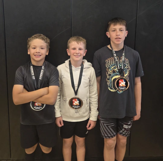 Wrestlers getting medals at Arizona State Folkstyle Wrestling Tournament at Crismon High in Queen Creek, AZ
