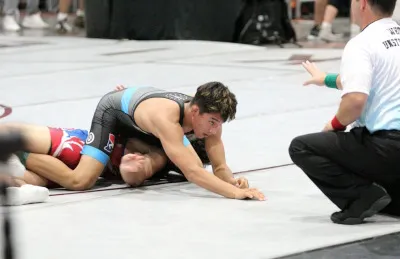 Southwest Wrestler about to pin their opponent